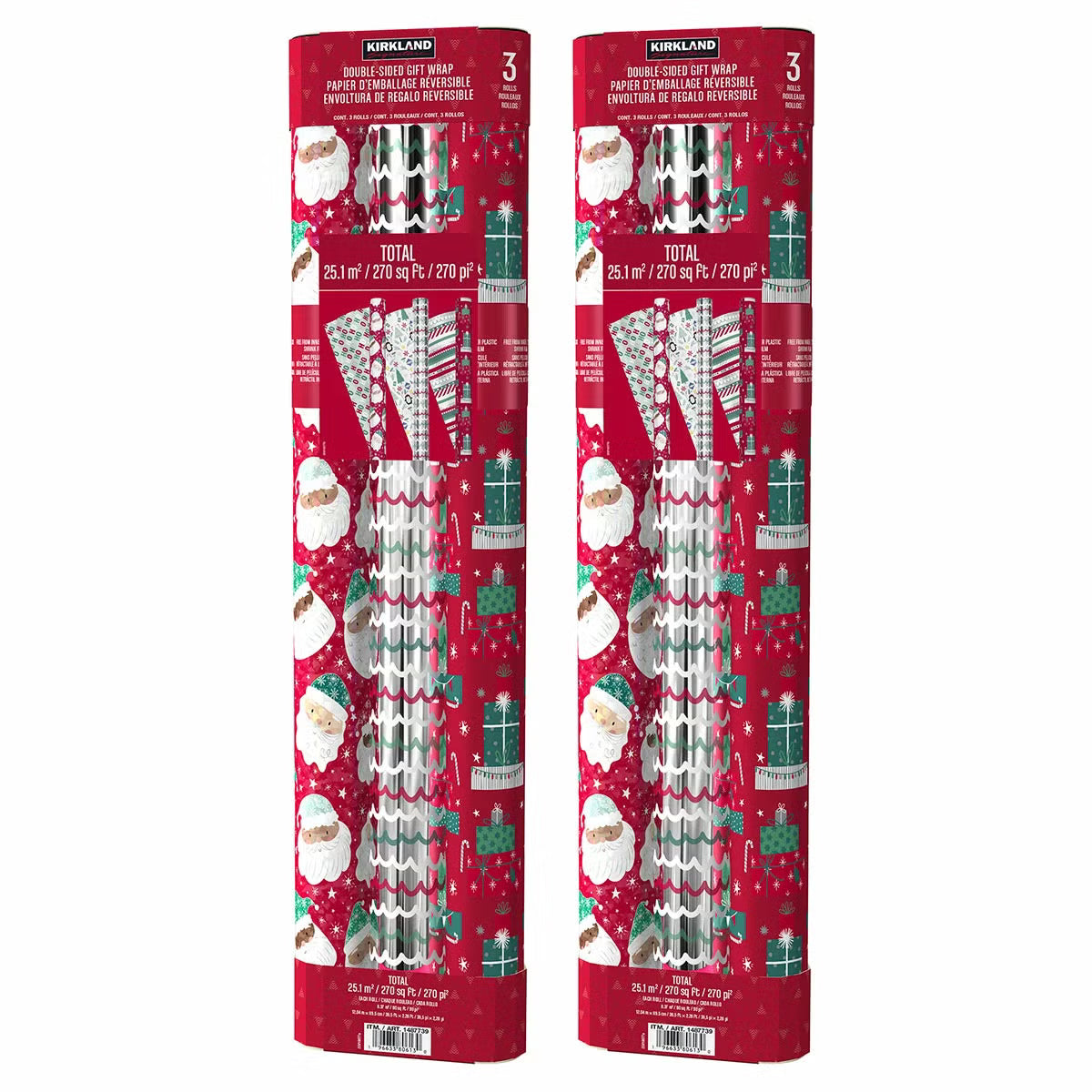 Top-down view of three rolls of red and white patterned reversible Christmas wrapping paper displayed on a rustic wooden table next to wrapped holiday gift boxes.
