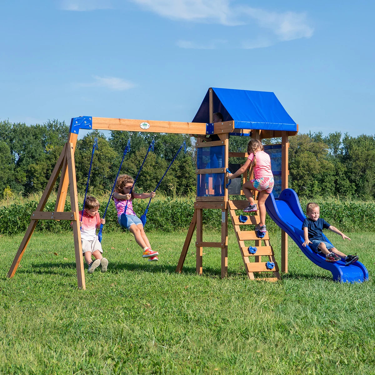 Backyard Discovery Aurora brown cedar wood swingset playcentre with canopy roof, rock wall ladder, wave slide, chalkboard, and garden swing area for children-4