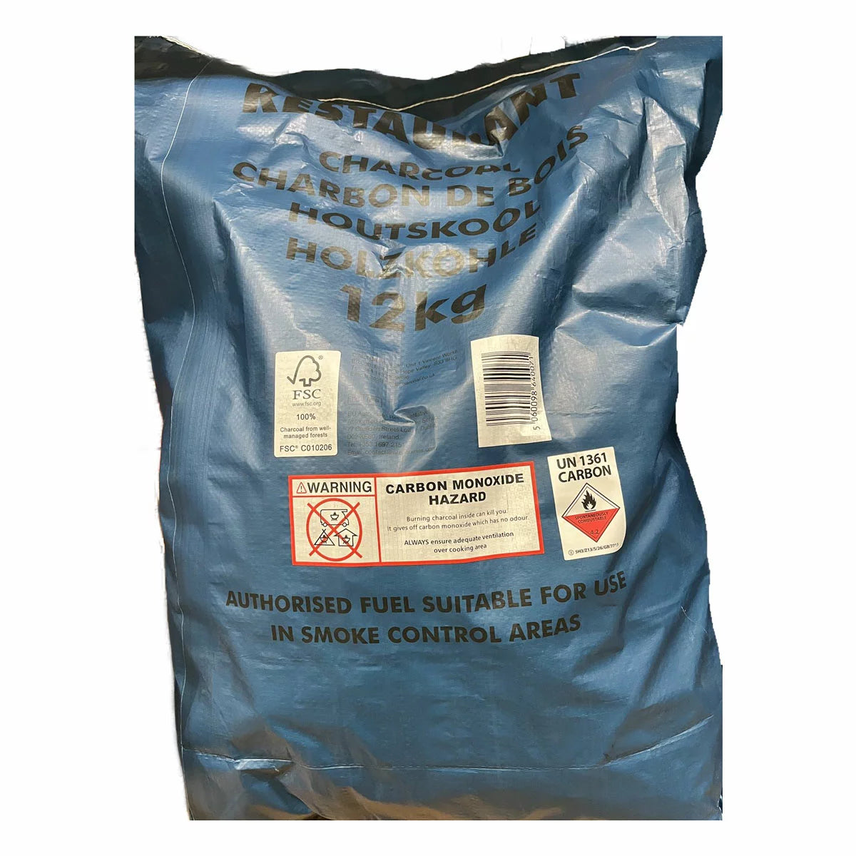 A 12kg bag of Bar-Be-Quick Restaurant Charcoal placed next to a high-end stainless steel professional grill, highlighting the clean, dense texture of the premium charcoal pieces.