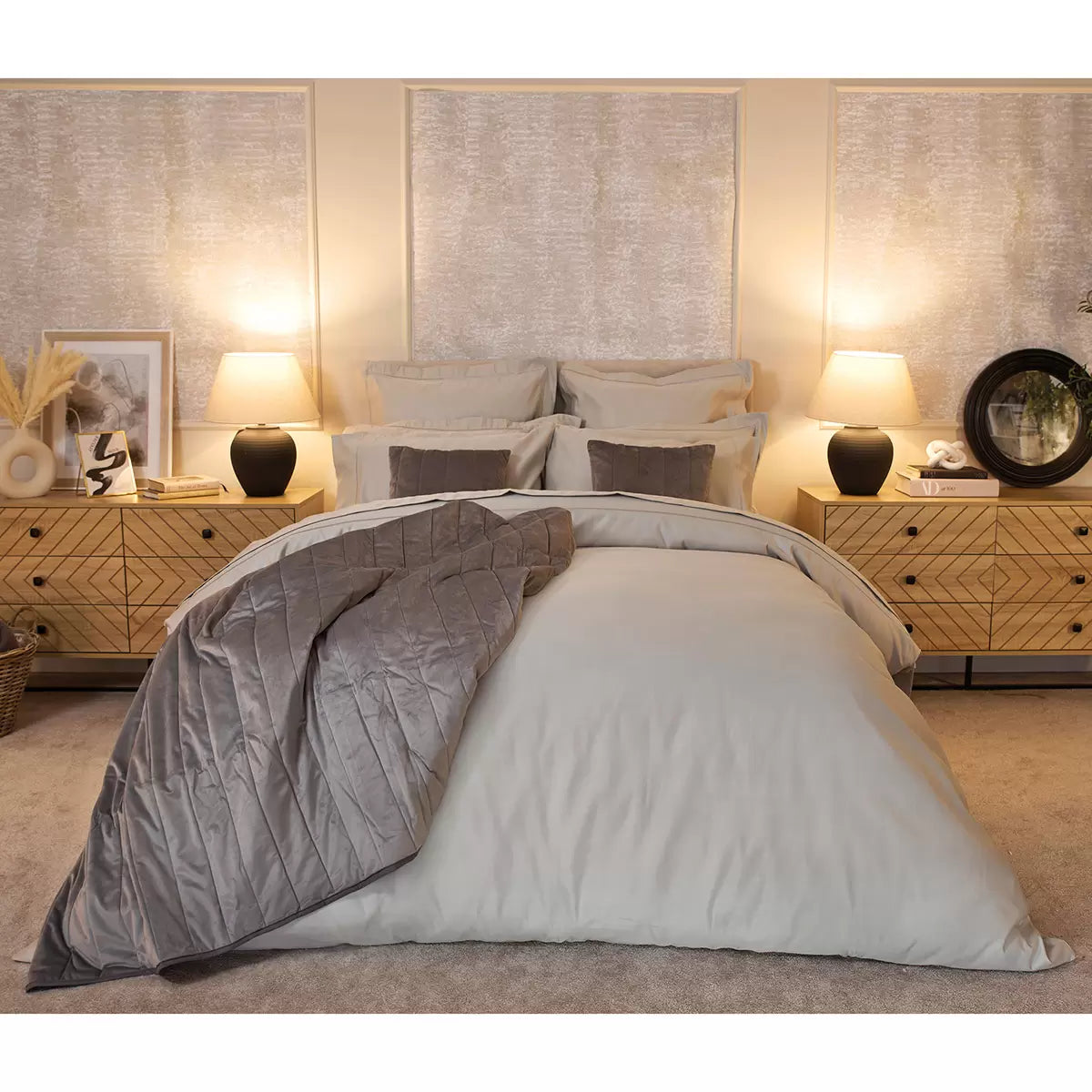 Platinum grey Belledorm 1000 thread count Egyptian cotton sateen duvet cover draped over a modern mattress showing its subtle sheen.