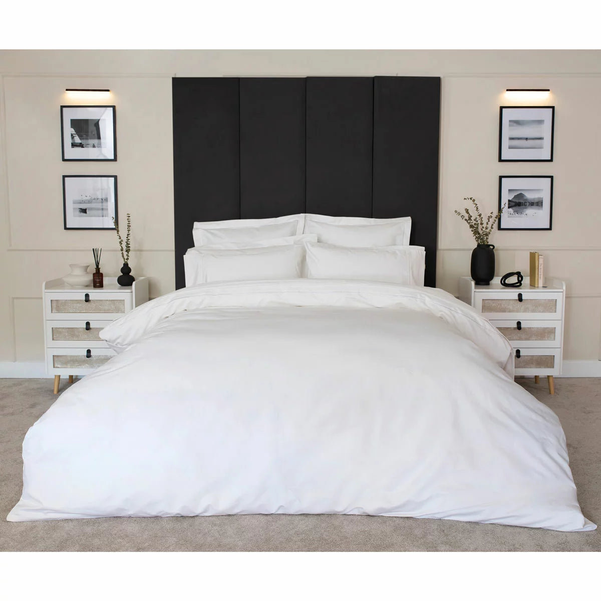 Close-up shot of the Belledorm 1200 thread count pure cotton sateen bedding bundle in bright white, showing the lustrous drape of the duvet cover and matching pillowcases on a neatly styled bed.