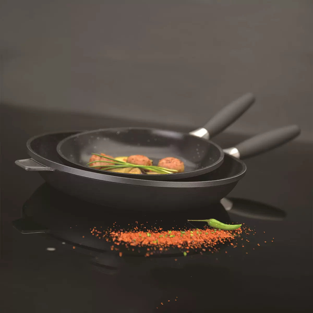 Enjoy healthier cooking with superior non-stick performance. Durable Eurocast construction, easy food release, and versatile 3-piece frying pan set for everyday cooking.