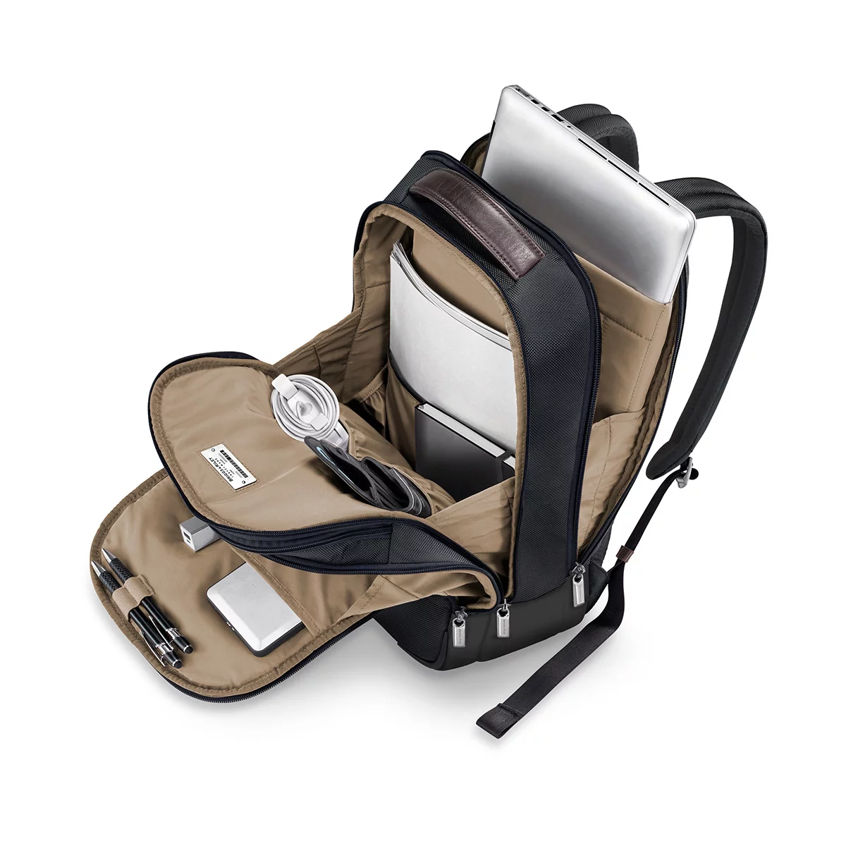 Black Briggs & Riley @work Medium Backpack with structured ballistic nylon finish standing upright, showcasing side zippers and top padded handle.