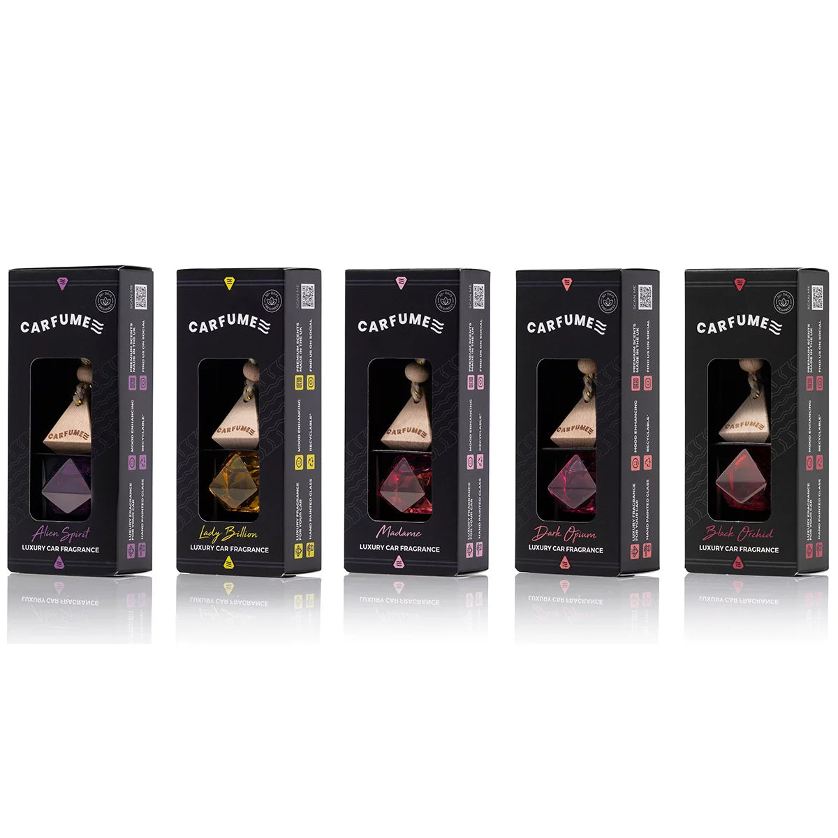 Five glass Carfume perfume car diffusers with natural wooden tops hanging together inside a modern vehicle cabin.