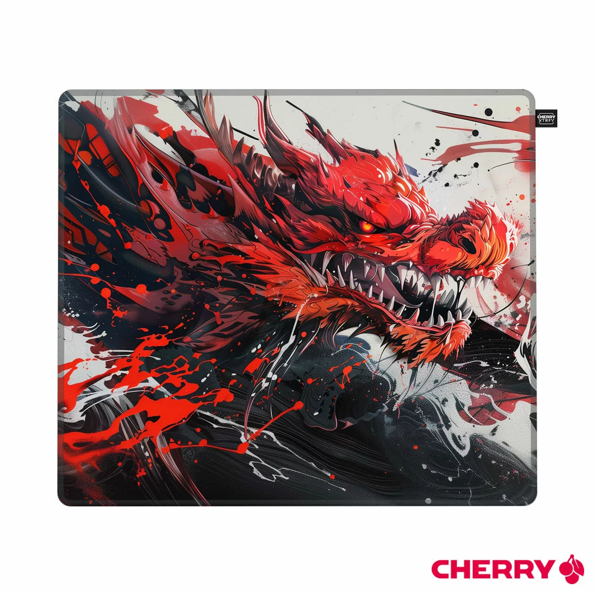 Top-down view of the large Cherry Hydrus Red Mouse Mat on a dark wooden desk, showcasing its smooth red fabric surface, black stitched edges, and a wireless gaming mouse resting in the center.