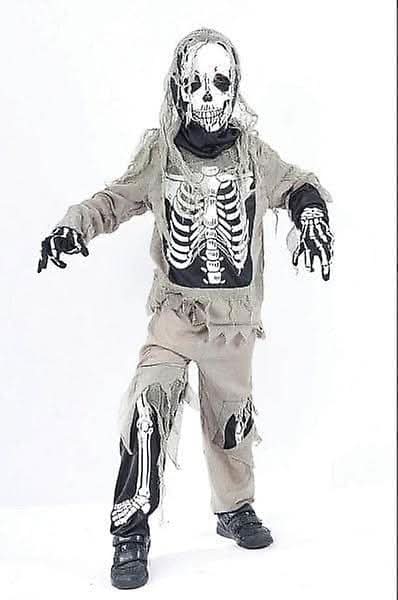 Front view of a child wearing an 11-year-size skeleton zombie Halloween costume with printed bone graphics and shredded fabric edges.