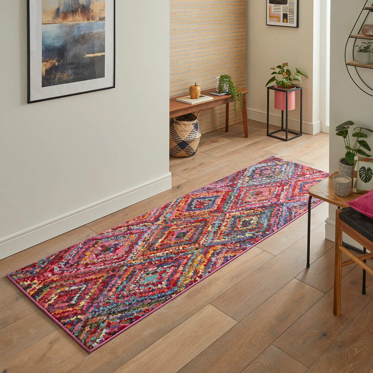 Concept Looms Carnaval Pink Runner with a bold geometric pattern displayed in a brightly lit UK home hallway.