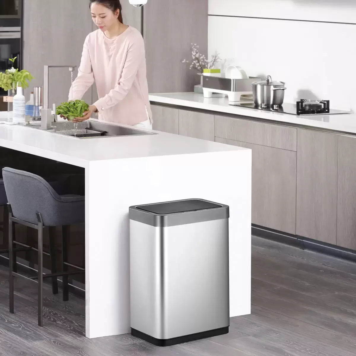EKO Mirage X-Sensor 40L stainless steel bin showing the glowing blue light sensor interface.