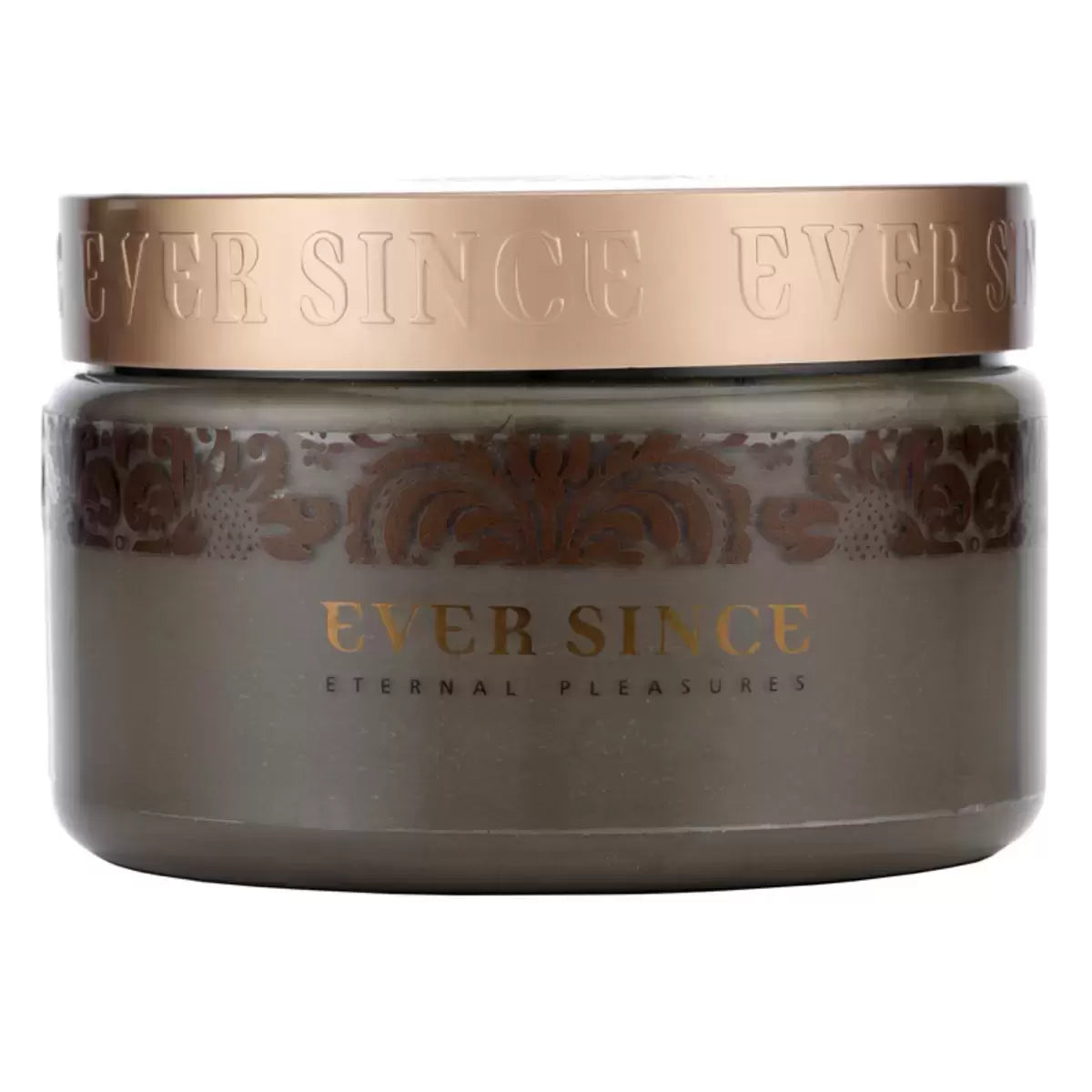 A 500g container of Ever Since Dead Sea Mud Mask positioned on a stone ledge next to a pile of soft linen towels, showing the rich, dark earthy texture of the product.