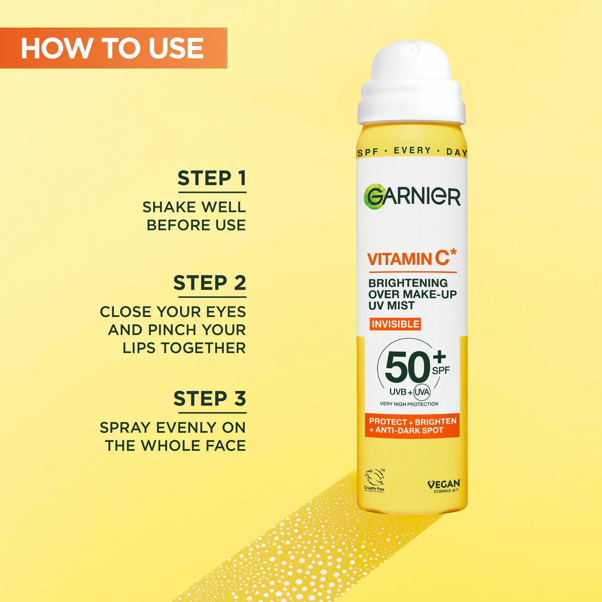 The Garnier Vitamin C UV Sun Cream Mist canisters, showcasing the SPF50+ protection and convenient spray application for on-the-go skincare.