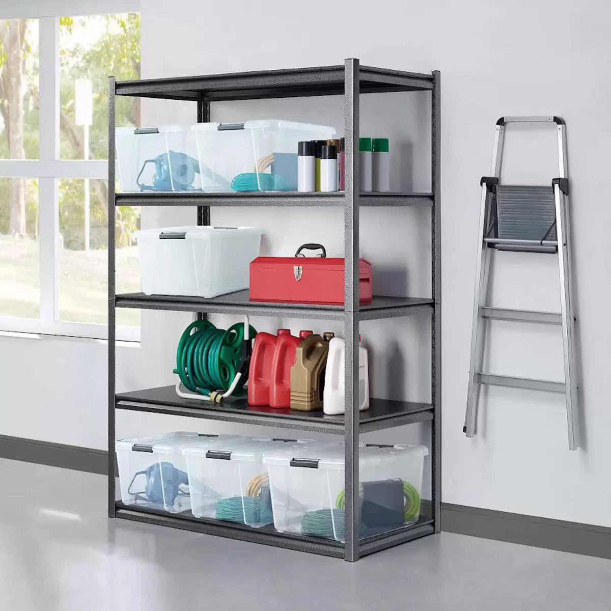 Gorilla 5 tier heavy duty storage shelf rack fully loaded with tools and storage bins in a tidy garage.