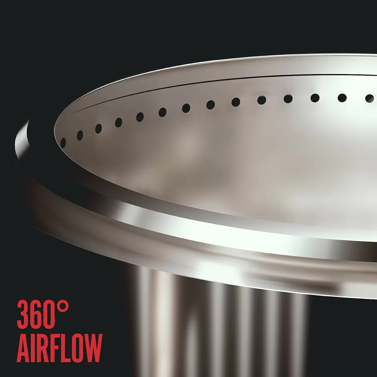 A 68cm stainless steel HerQs Chief fire pit glowing with intense, smokeless flames, positioned on a stone patio during a twilight garden gathering.
