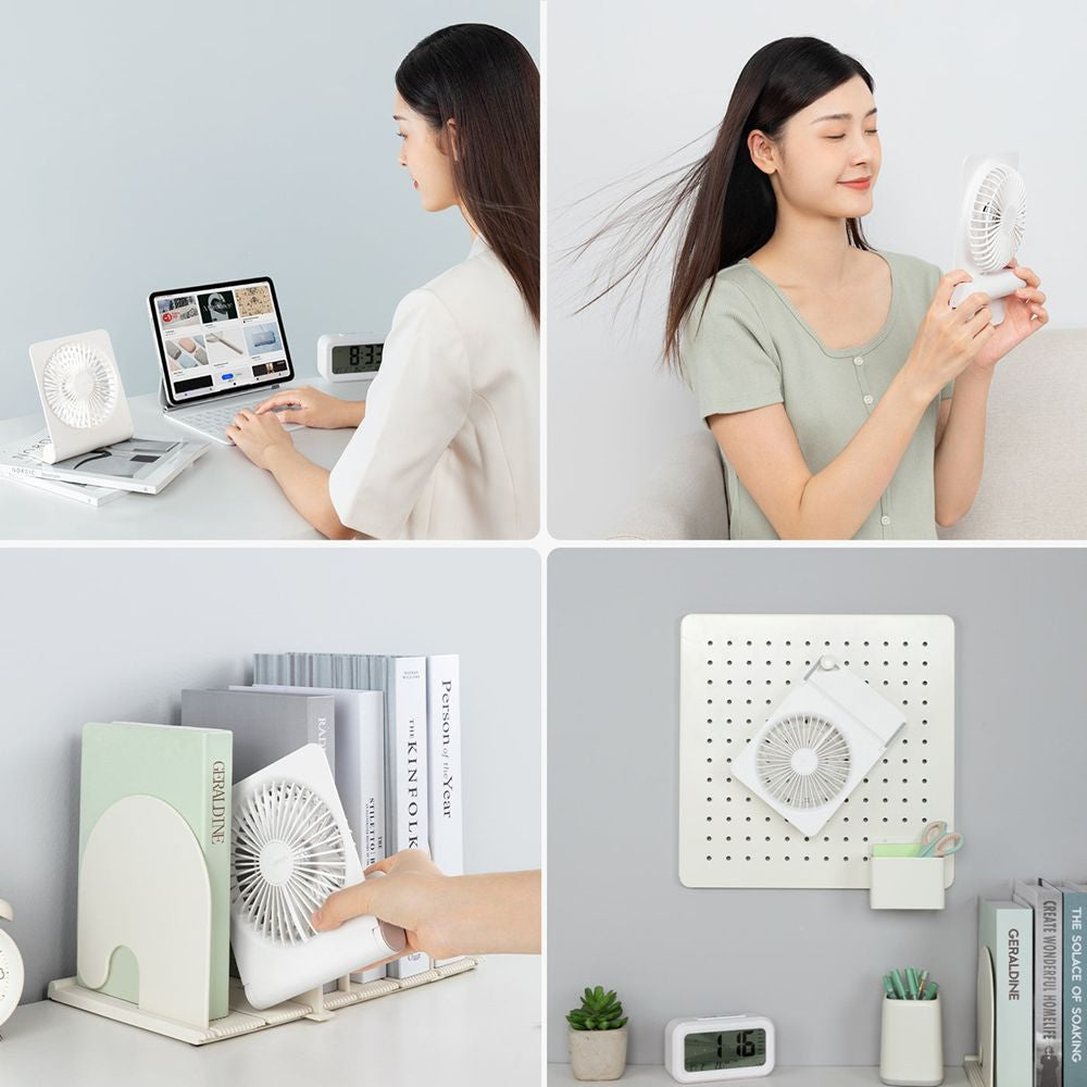 JisuLife Life3 portable table fan tilted at 160° angle on a desk, showcasing USB-C charging port and compact plastic design