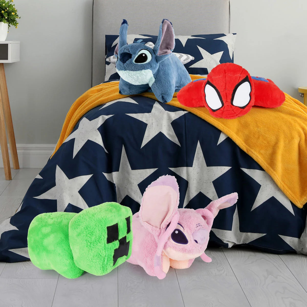 Licensed character children's pillow play pal made of soft faux rabbit fur shown in folded plush toy and opened cushion positions on a bed.Kids Character Pillow Play Pal | Rapid Mainland Delivery