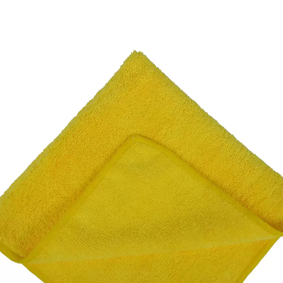 Stacked bright yellow Kirkland Signature ultra plush microfibre towels showing high-density fiber weave resting on a clean automotive workbench.