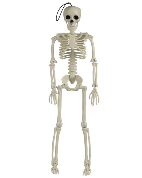Full-length view of a 35cm off-white plastic hanging skeleton with posable joints suspended by a black rope against a rustic dark backdrop.