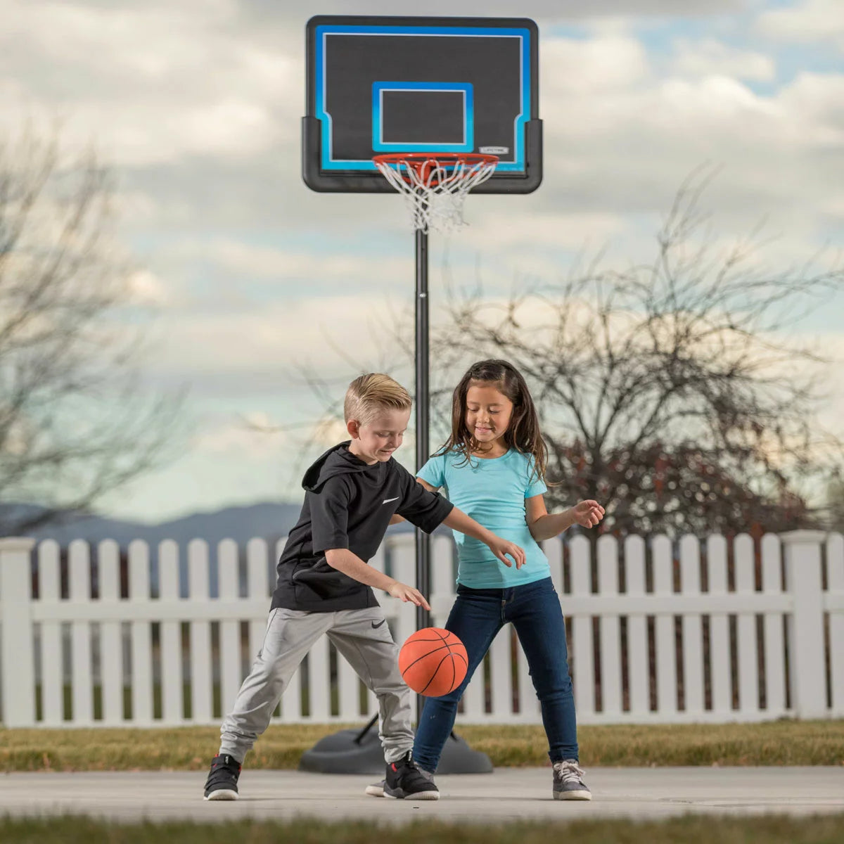 Lifetime 32 Inch Youth Portable Basketball Hoop with adjustable height, durable backboard, and portable base designed for young basketball players.