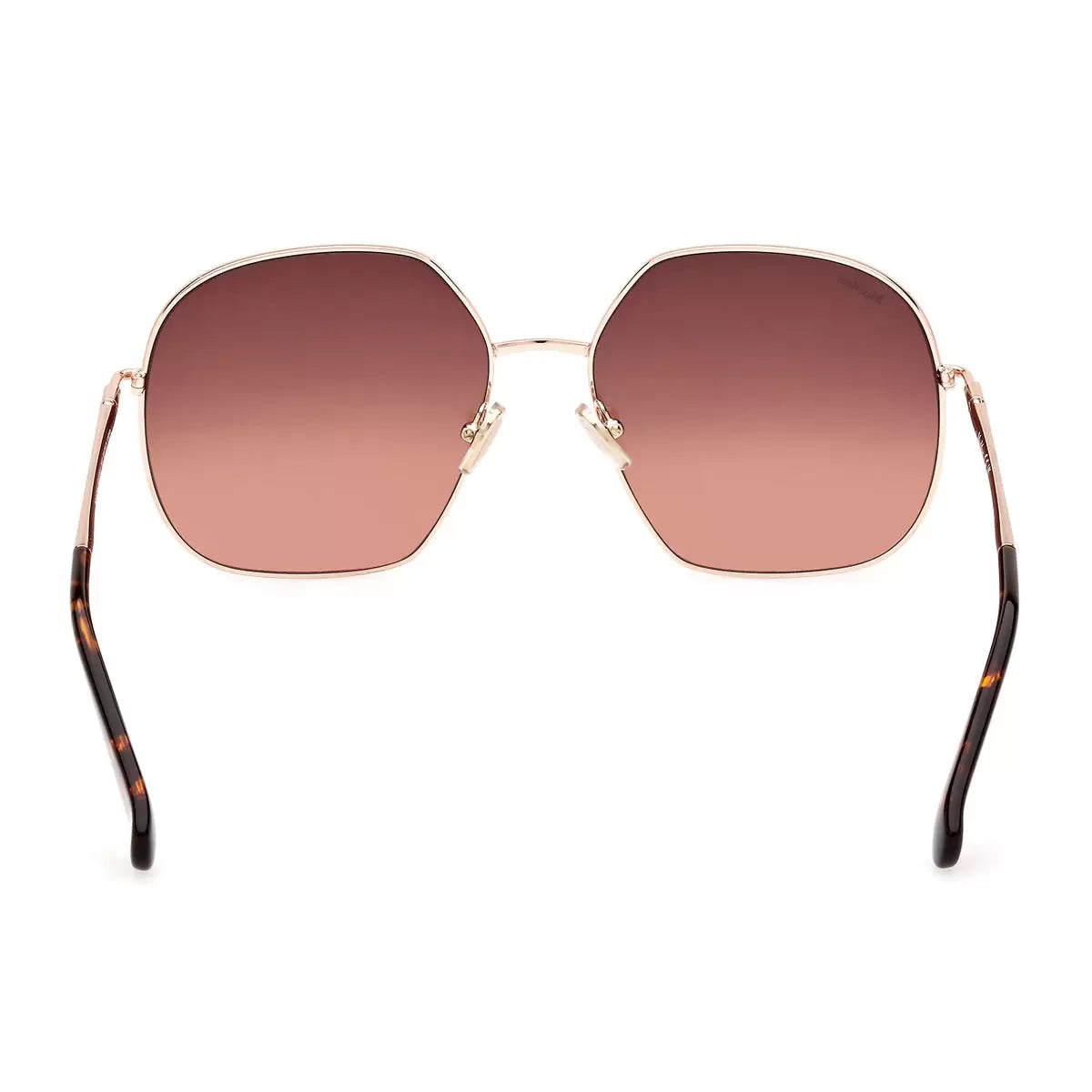 A side-angle view of the MaxMara MM0061 28F sunglasses featuring a sleek, polished frame finish resting on a clean, neutral surface.