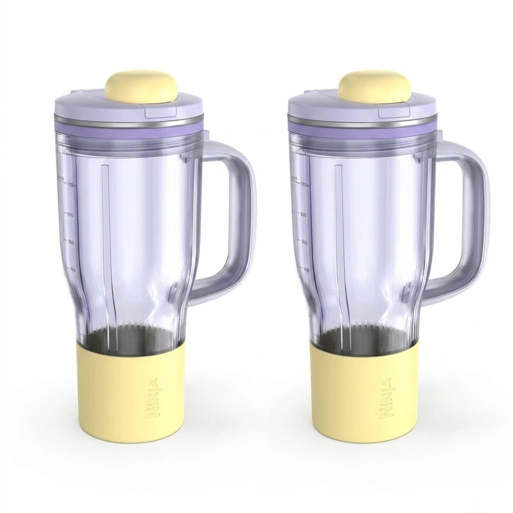 The 710ml Ninja BlendBoss travel tumbler with its lid, removable straw, and carry handle showcased in a clean, minimalist setting.