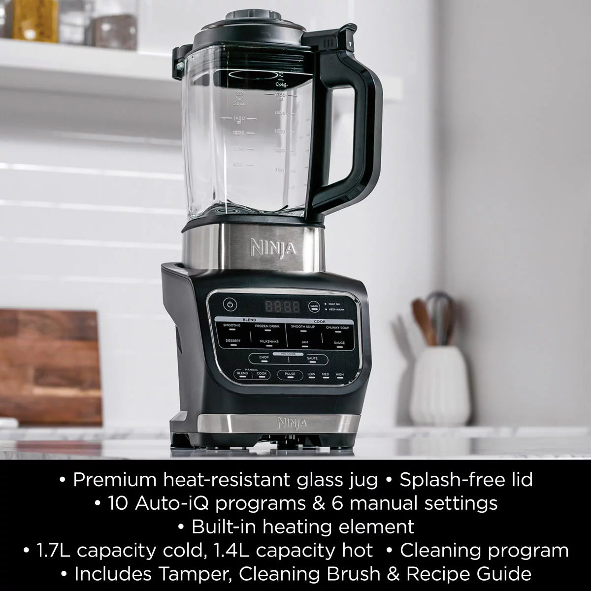 Front view of the black Ninja Foodi HB150UK Blender and Soup Maker with its clear glass jug mounted on the 1000W motor base on a clean kitchen counter.