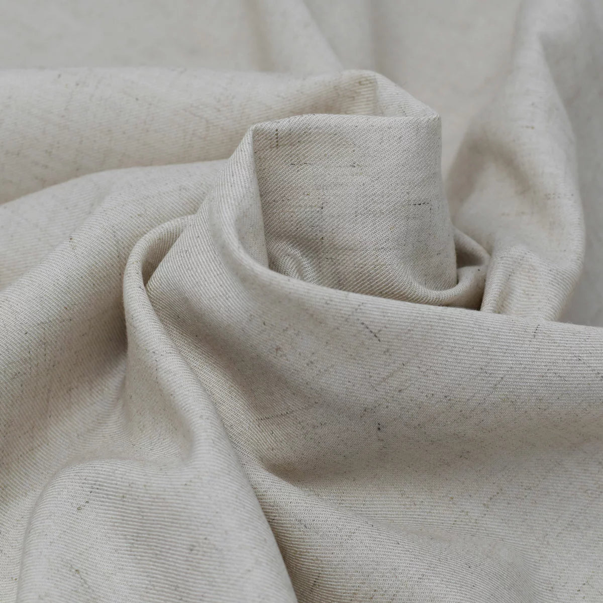 Natural earth-toned Panda bamboo and French linen fitted sheet pulled taut over a deep mattress corner showing its crisp matte texture.