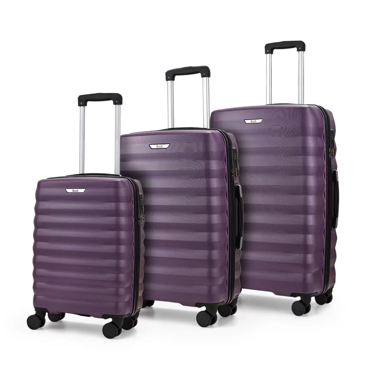 Rock Berlin 3 piece hardside luggage set lined up neatly in graduating sizes on a modern minimalist station platform floor.