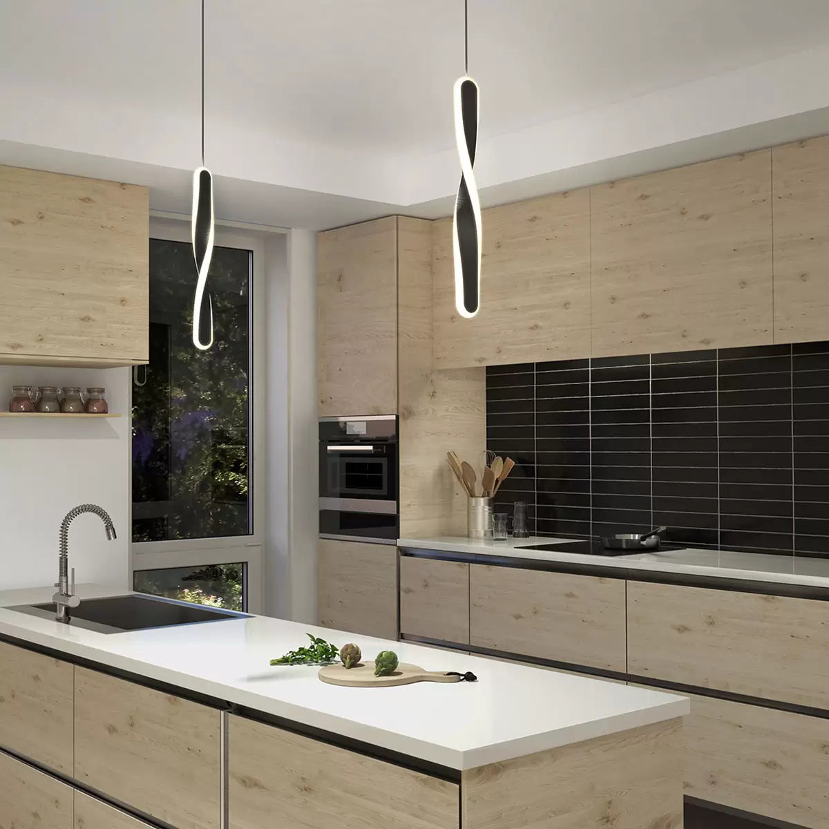 Black Artika Finley LED pendant light with modern minimalist design, suspended over kitchen island for ambient lighting