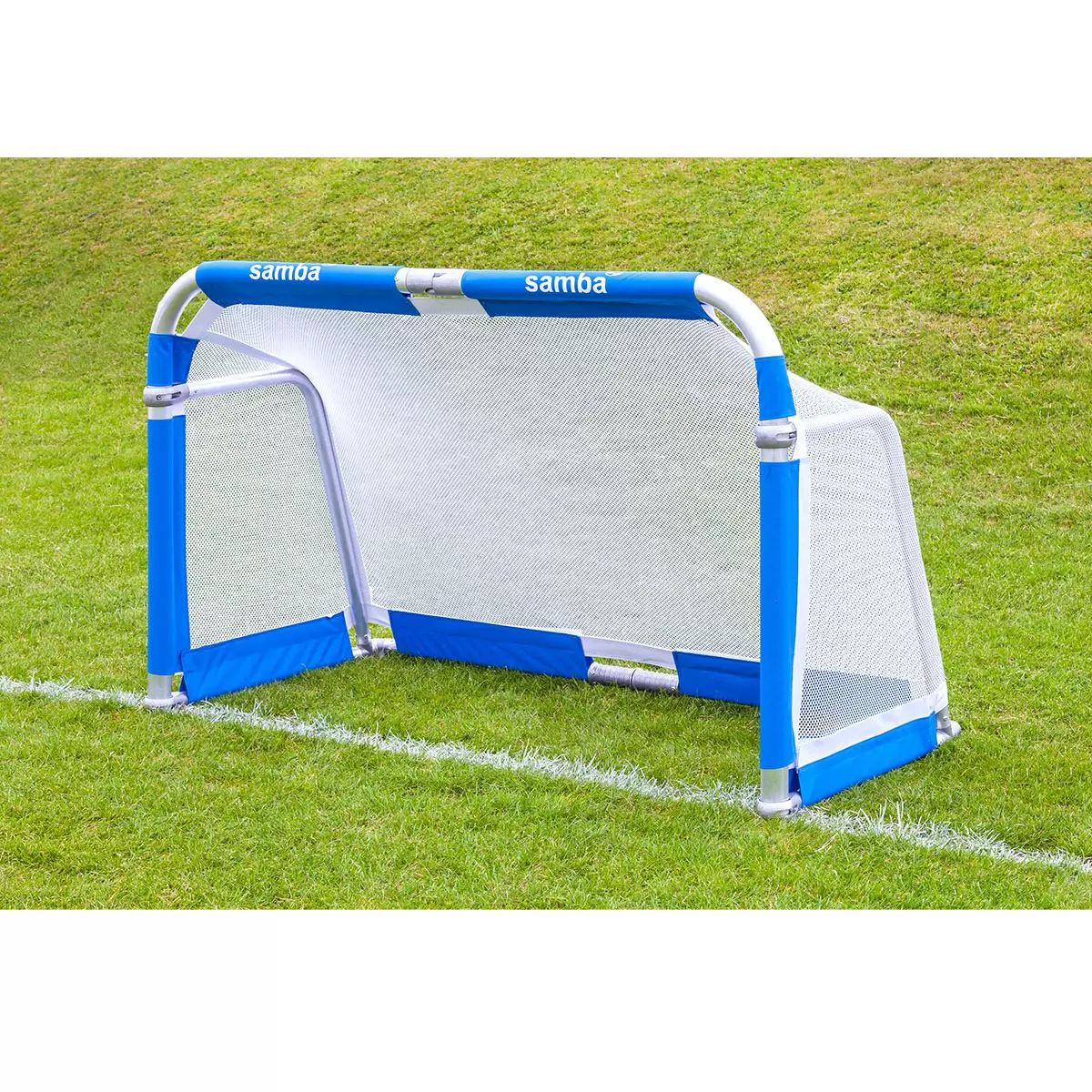 Pair of silver Samba 5ft x 3ft folding aluminium goals with black nets set up opposite each other on a green grass football pitch.