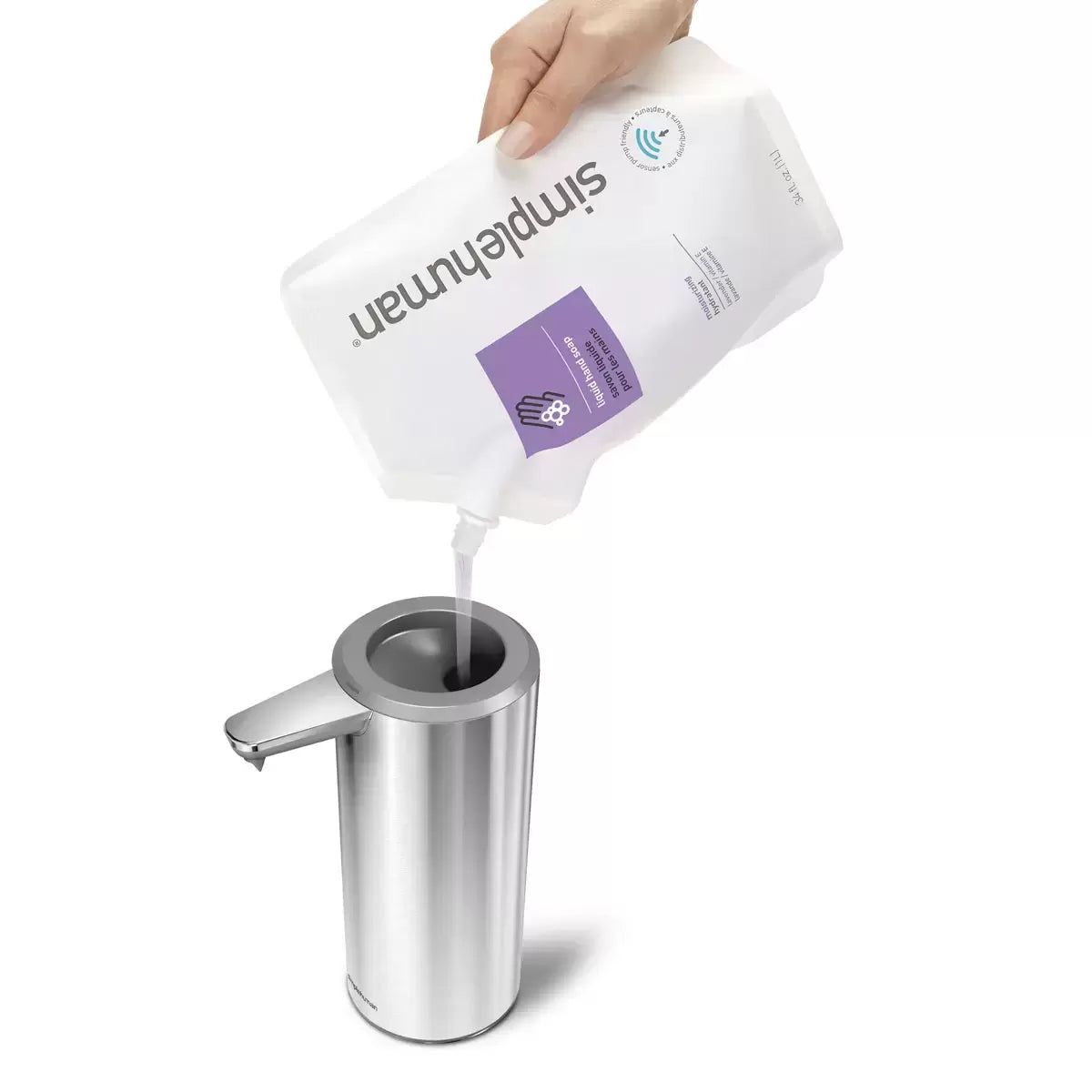 Two Simplehuman motion sensor soap pumps displayed on a clean modern countertop, showcasing their sleek finish and convenient touch-free design.
