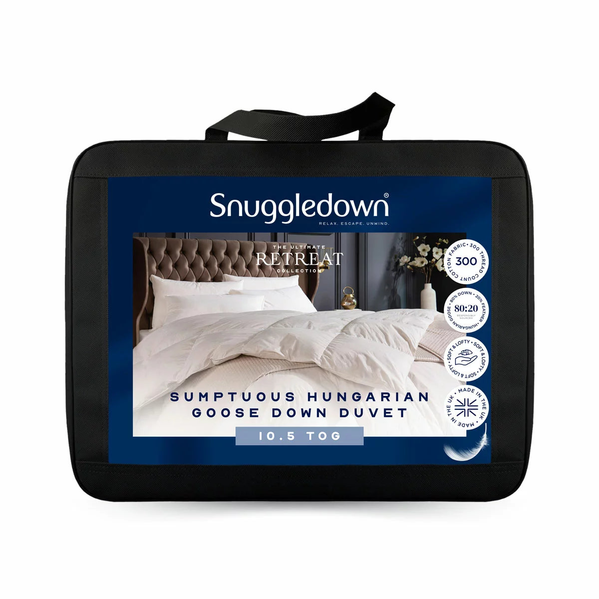 Angle view of the white Snuggledown Retreat Hungarian Goose Down 10.5 Tog duvet dressed on a king-size bed, highlighting its 300 thread count cotton jacquard weave and double-stitched piped edges.