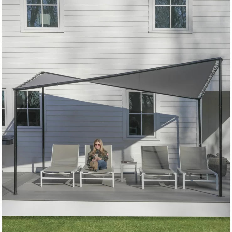Sojag 12ft x 12ft Del Ray aluminum frame gazebo with tan fabric roof and mosquito netting.