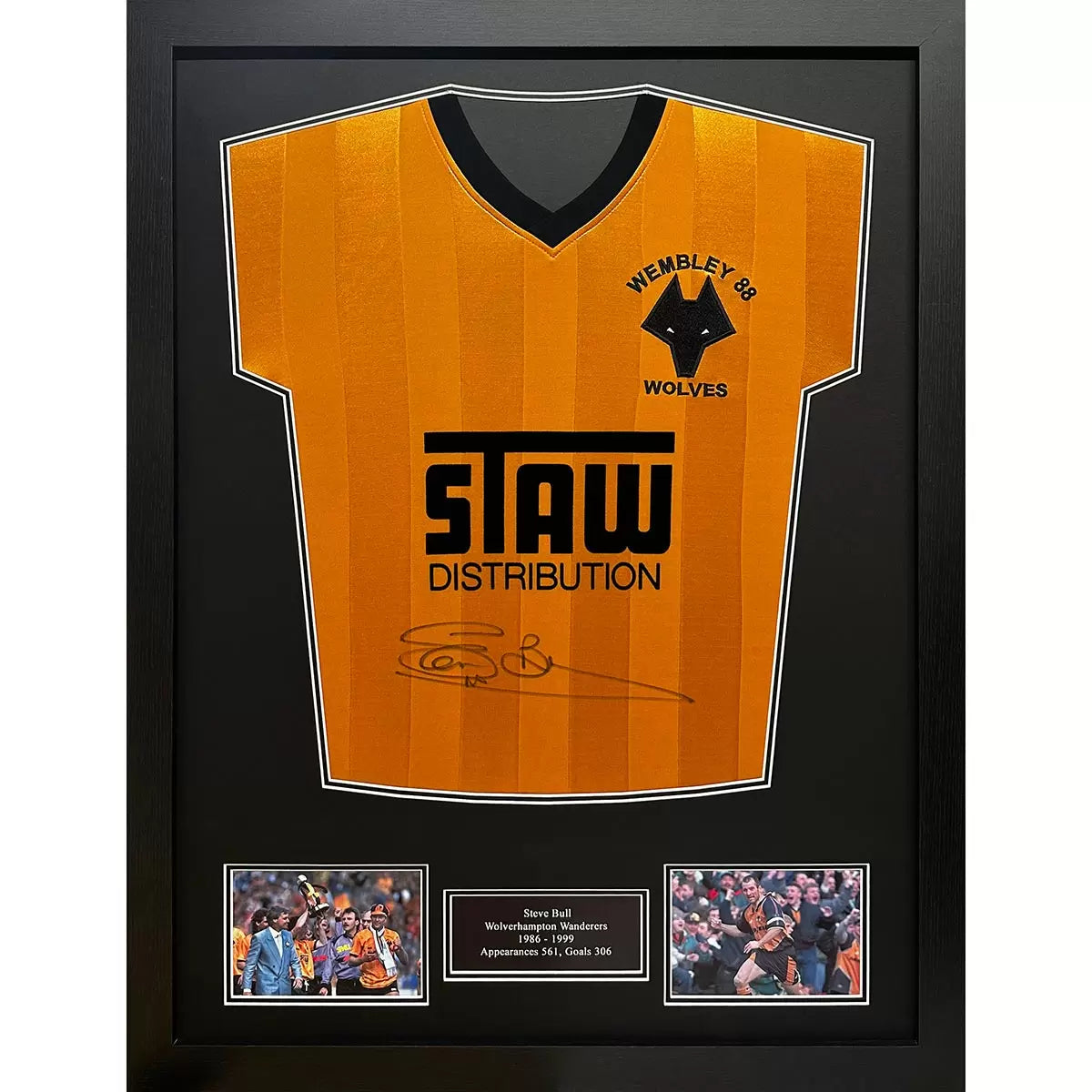 A professionally framed 1988 retro Wolverhampton Wanderers shirt signed by Steve Bull, displayed in a black frame against a clean wall setting.