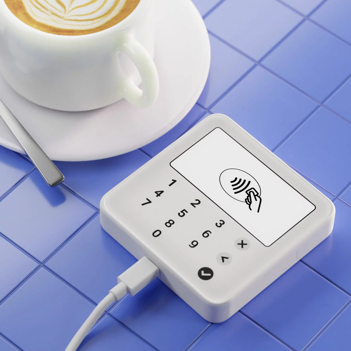 White SumUp Solo Lite compact card reader with digital screen displaying a payment prompt on a counter next to a smartphone.