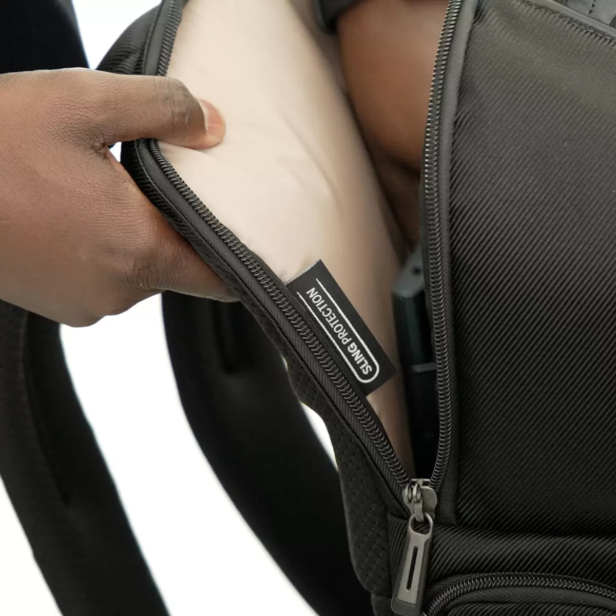 Black Targus Mobile Elite Backpack with water-resistant base standing upright, showing its front accessory pockets and dual side water bottle holders.