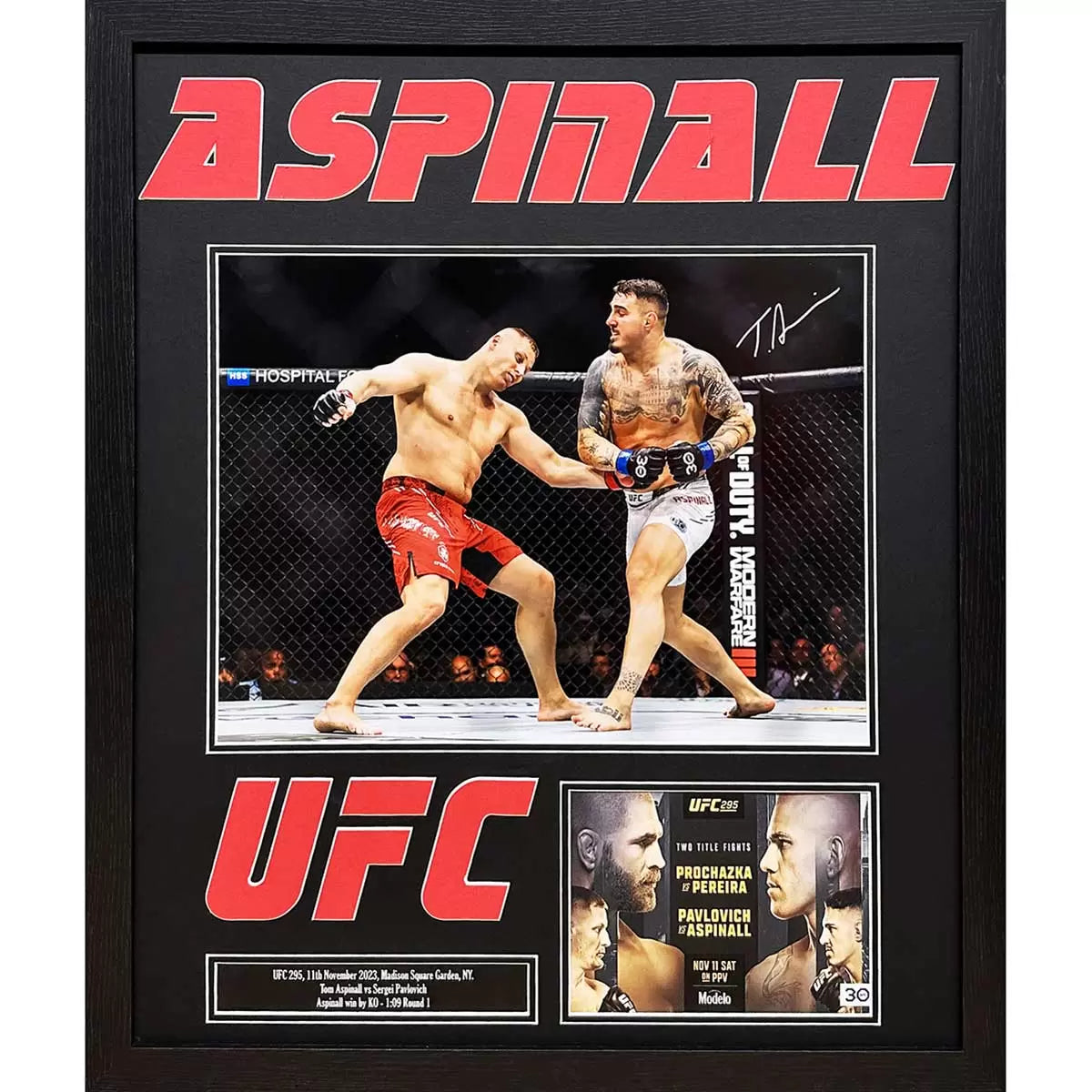 Tom Aspinall hand-signed UFC action photograph mounted in a professional black display frame against a clean, neutral background.