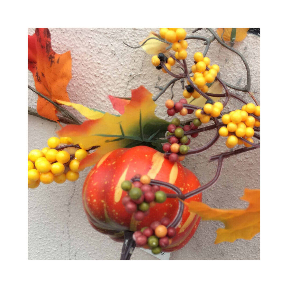 A 1.8m LED light-up autumn pumpkin and maple leaf vine garland glowing warmly draped across a wooden front door.