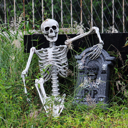 Full-length 170cm life-size realistic white plastic posable human skeleton standing against a dark wall setup.