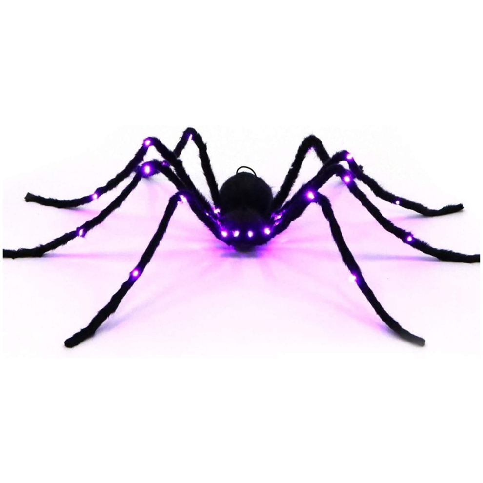 A 2.9ft large hairy black spider with glowing LED eyes clinging to a spooky web outdoors during Halloween night.