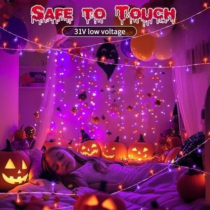 A 20m string of 200 orange and purple Halloween fairy lights glowing brightly across an outdoor porch at night