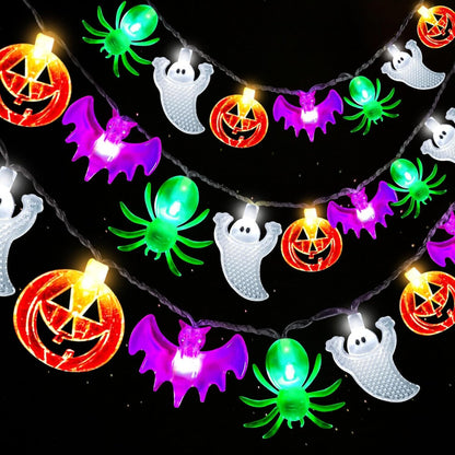 A 20ft string of 40 multi-shaped Halloween LED lights featuring pumpkins, bats, spiders, and ghosts glowing along an indoor mantelpiece.