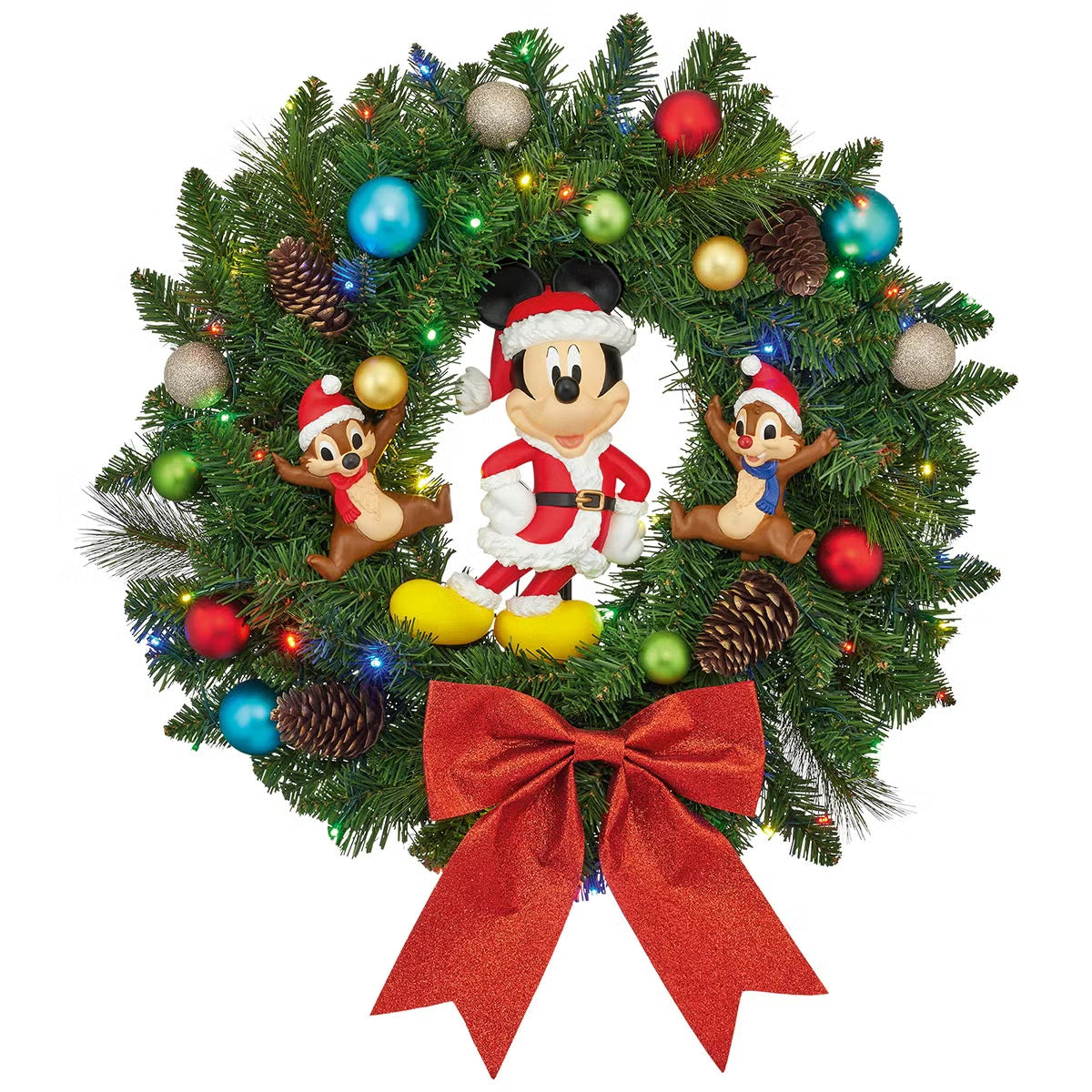Front view of a 22-inch lush green Christmas wreath featuring Mickey Mouse and friends ornaments illuminated by warm battery-operated LED lights hanging on a wooden door.