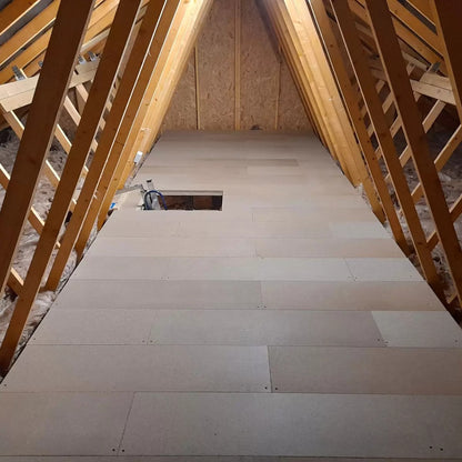 LoftZone StoreFloor raised loft boarding framework with 100mm insulation installed underneath a strong timber storage platform.