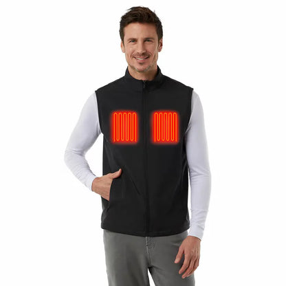 Front view of a sleek black 32 Degrees heated vest laid flat, showing the illuminated waterproof chest controller button next to its compact 10,000mAh power bank battery.