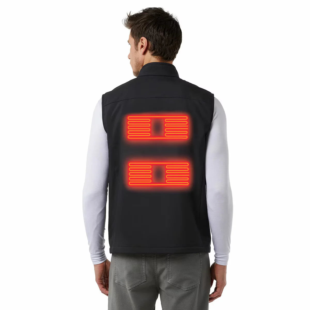 Front view of a sleek black 32 Degrees heated vest laid flat, showing the illuminated waterproof chest controller button next to its compact 10,000mAh power bank battery.