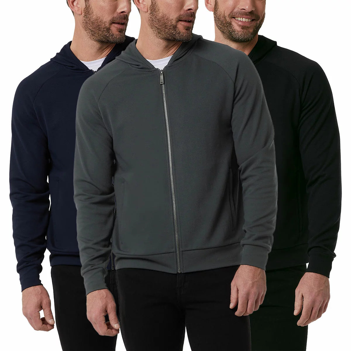 Front view of a man wearing the textured 32 Degrees Pique Full Zip Hoodie featuring zippered hand pockets in a modern casual setting