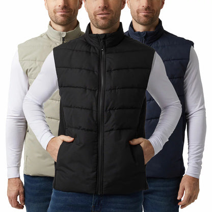 Front view of a man wearing a navy 32 Degrees Mens Mixed Media Gilet with quilted torso and hidden zip pockets.