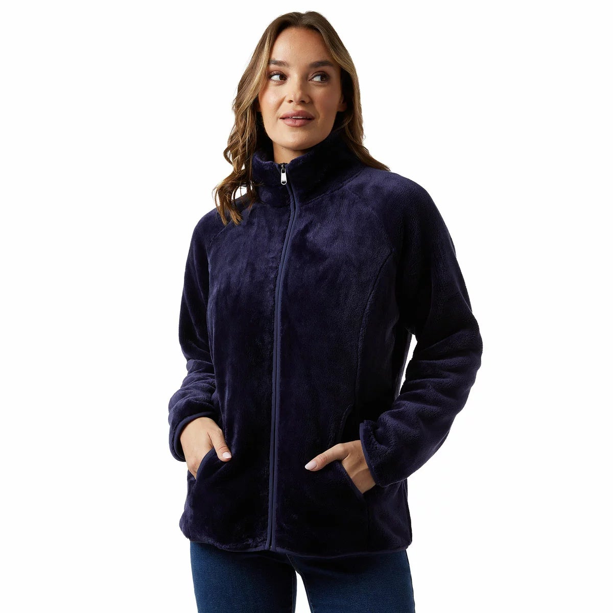 Front view of a woman wearing the plush 32 Degrees cream heavyweight fleece jacket with stand collar and zipped front outdoors.