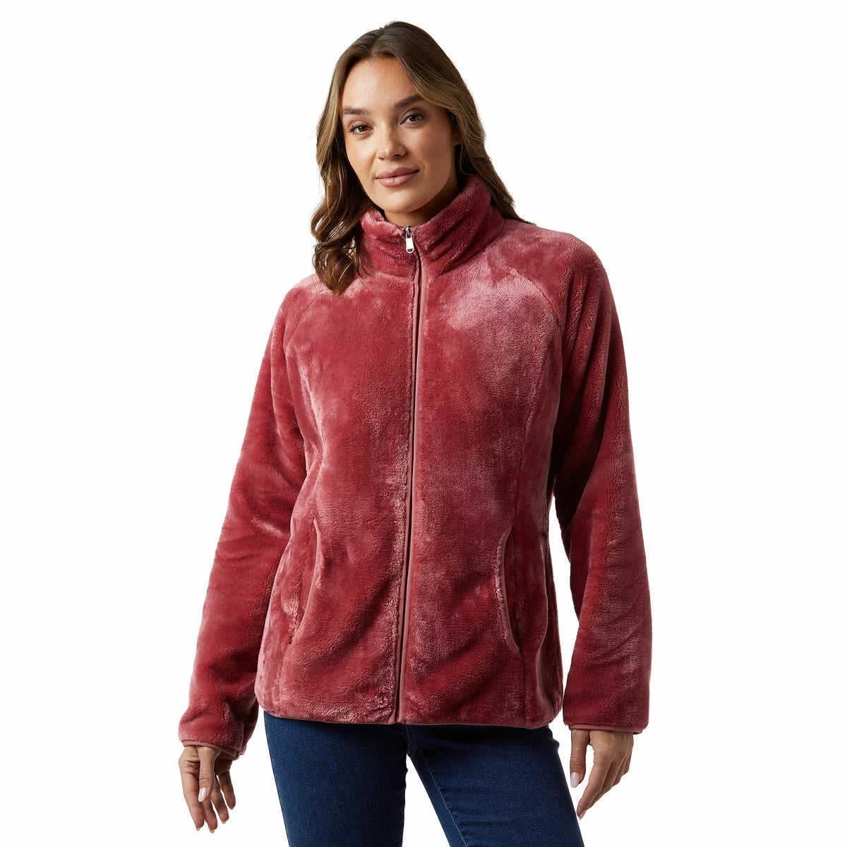 Front view of a woman wearing the plush 32 Degrees cream heavyweight fleece jacket with stand collar and zipped front outdoors.