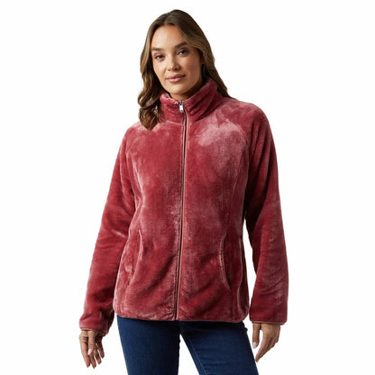 Front view of a woman wearing the plush 32 Degrees cream heavyweight fleece jacket with stand collar and zipped front outdoors.
