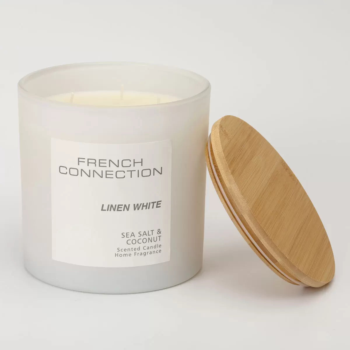 French Connection Pastel XL 4-wick scented candle with bamboo lid on display
